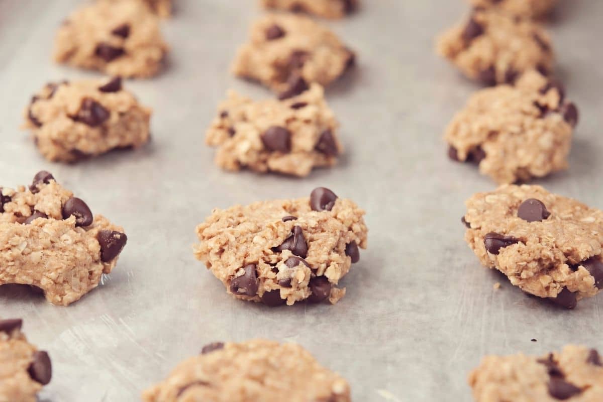 Cookie dough on parchment paper.