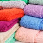 Stacks of colorful towels.