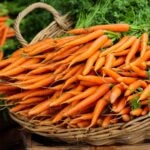 Basket full of organic fresh carrots.