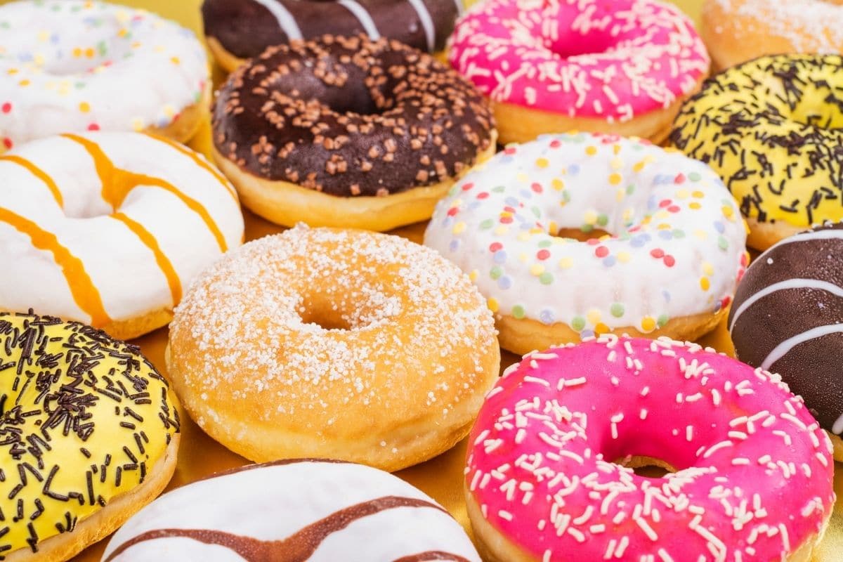 Bunch of different donuts with different icing.