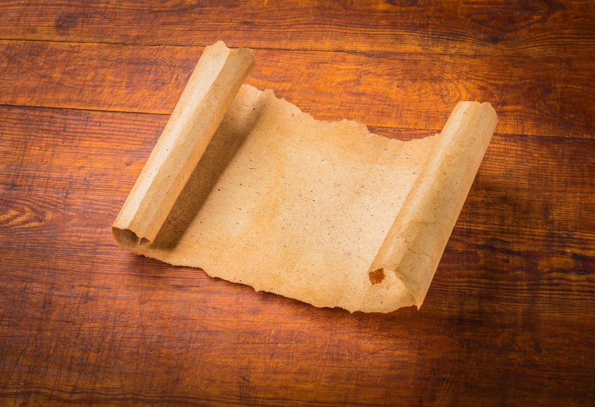 Piece of parchment paper on brown table.