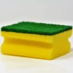 Green-yellow sponge on white background.