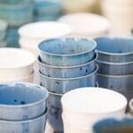 Piles of colorful ceramic bowls