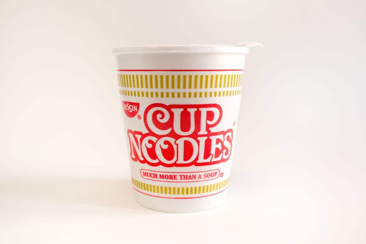 Nissin instant noodle cup on white background