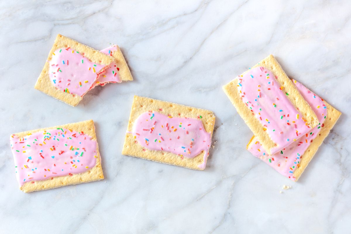 Strawberry pop-tarts on white-gray background