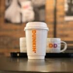 Dunkin donuts cup on black table