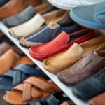 Different types of shoes in shoe rack