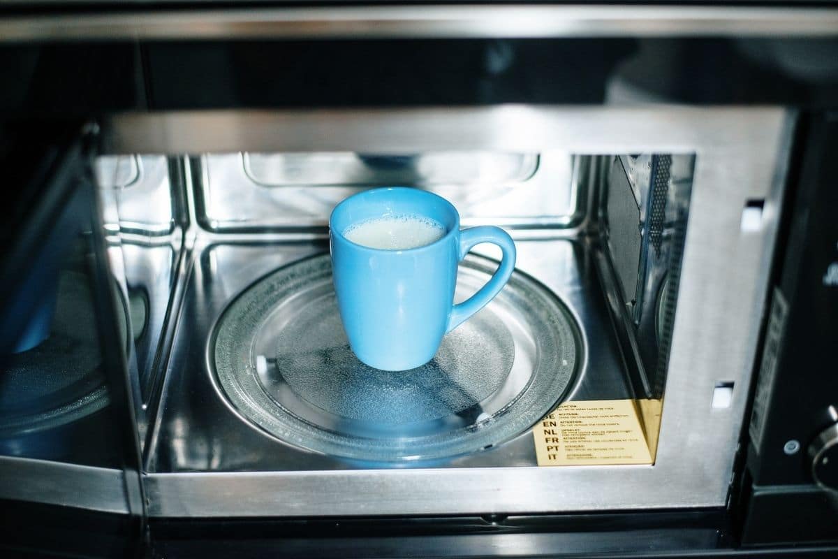Blue cup in microwave