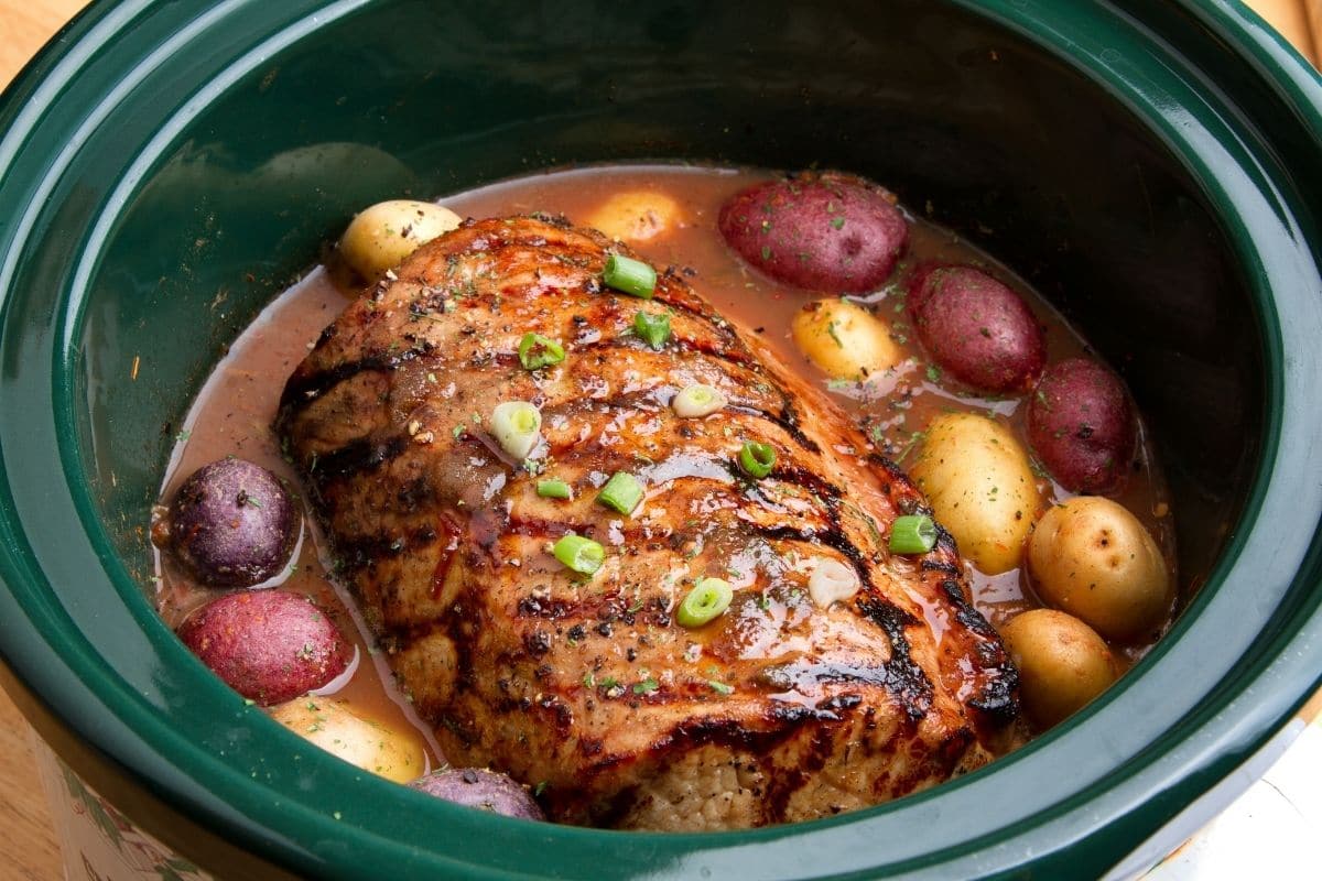 Crock pot insert with meat and potatoes