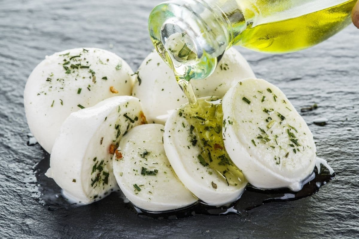 Mozzarella cheese sliced , seasoned and oiled