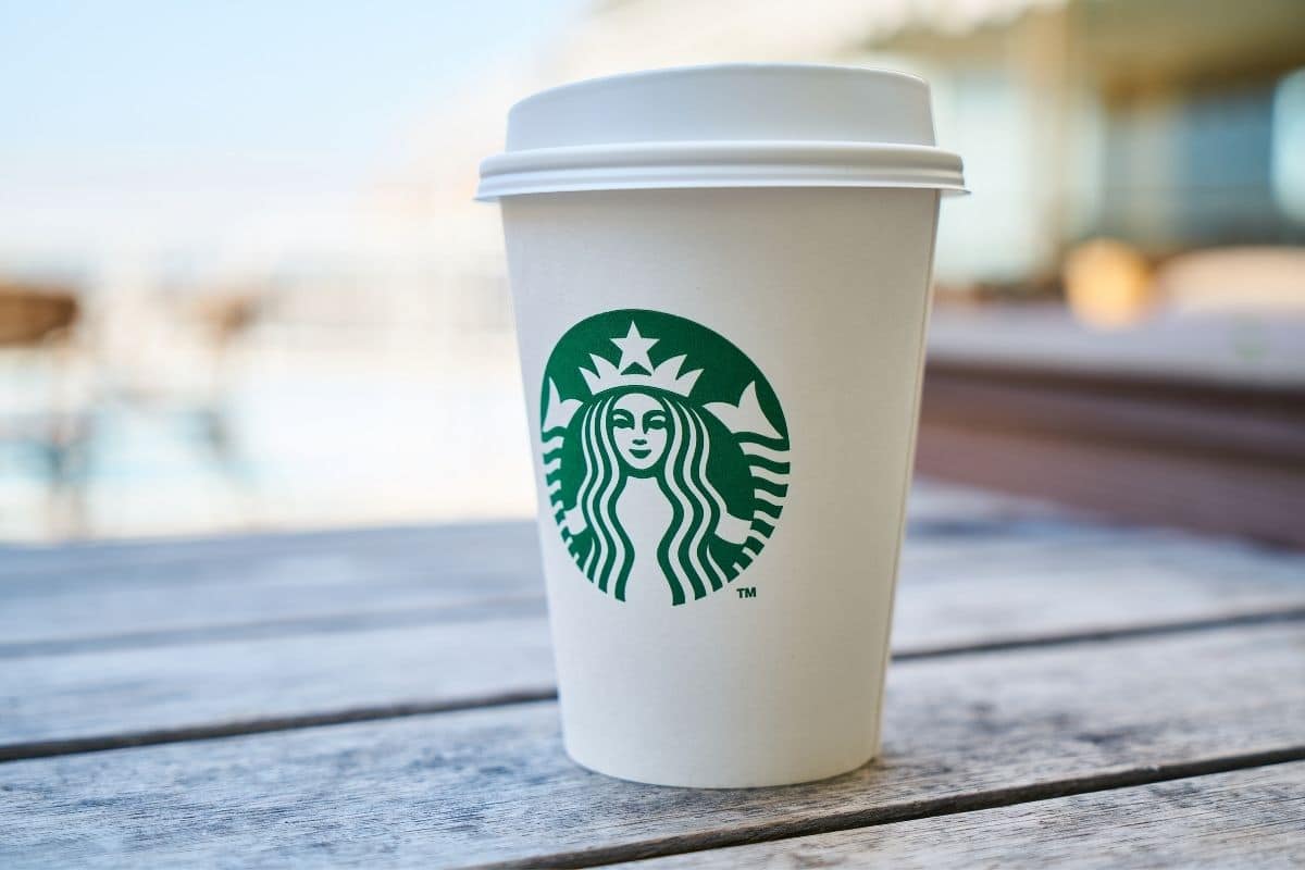 Starbucks cup on wooden table