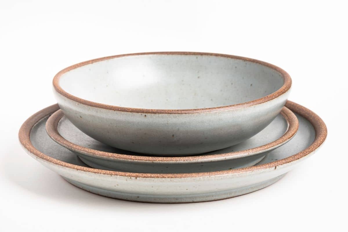 Stonewate bowl and plates on white background