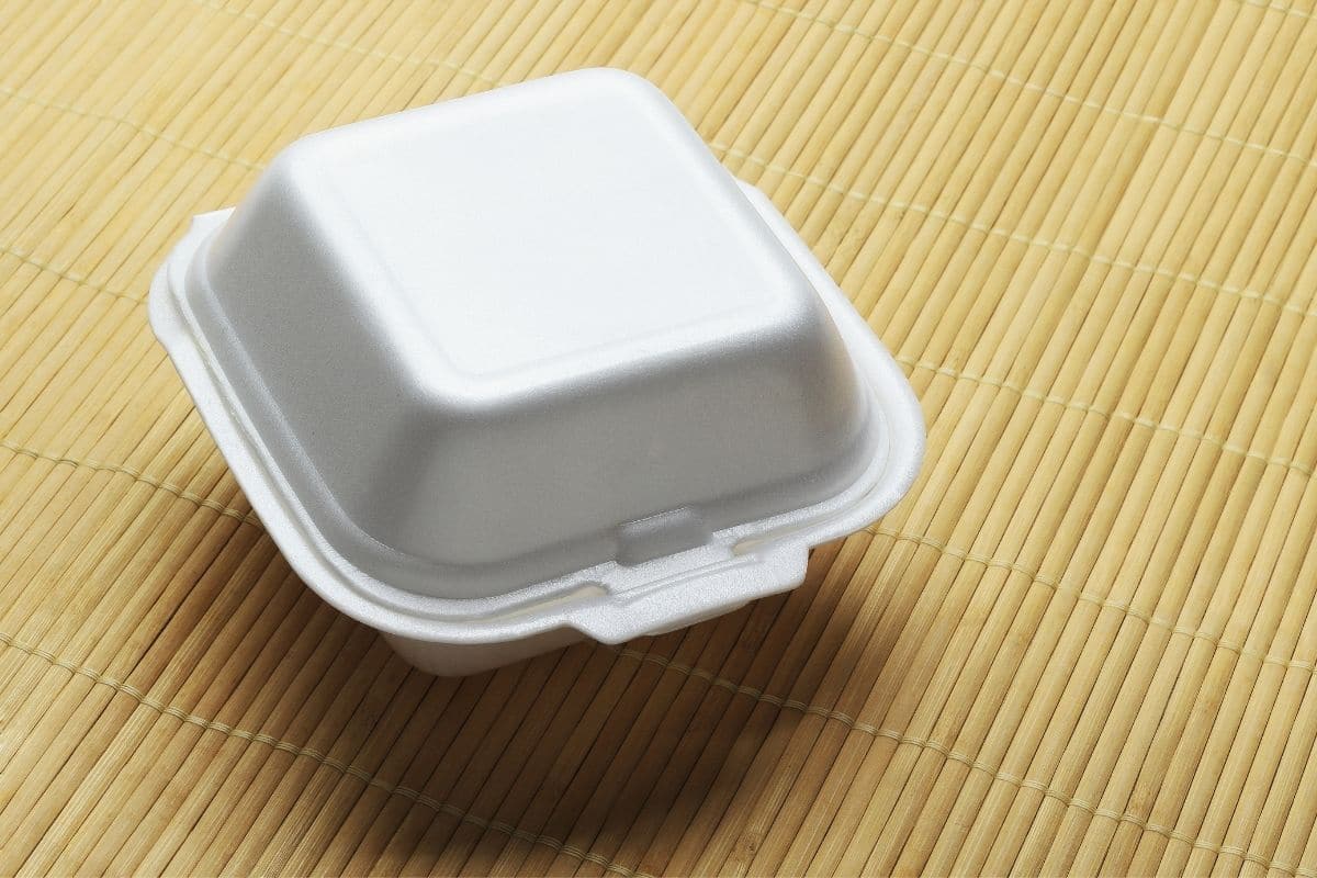 Styrofoam container on bambus pad