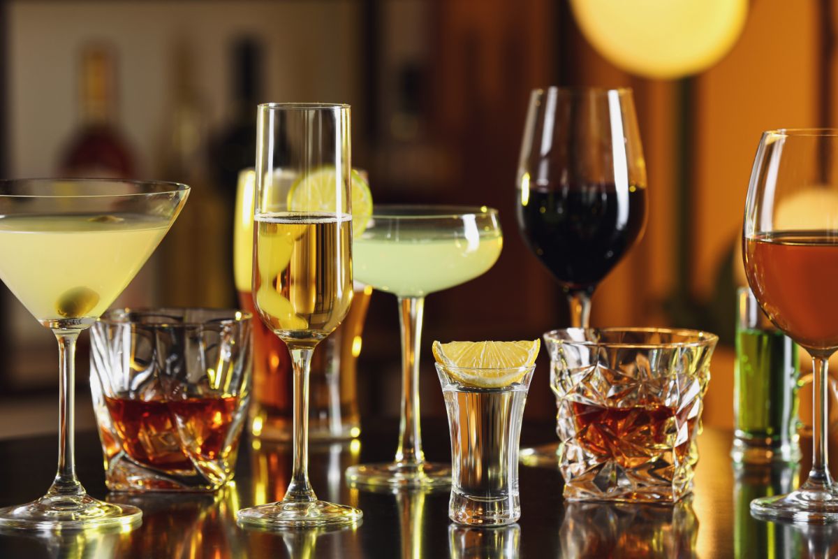 Different varieties of alcohol in glass cups.