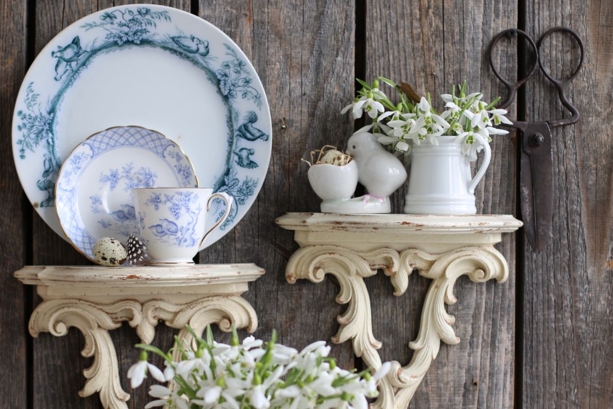 Bunch of different varieites of ironstone ware on a wooden table.