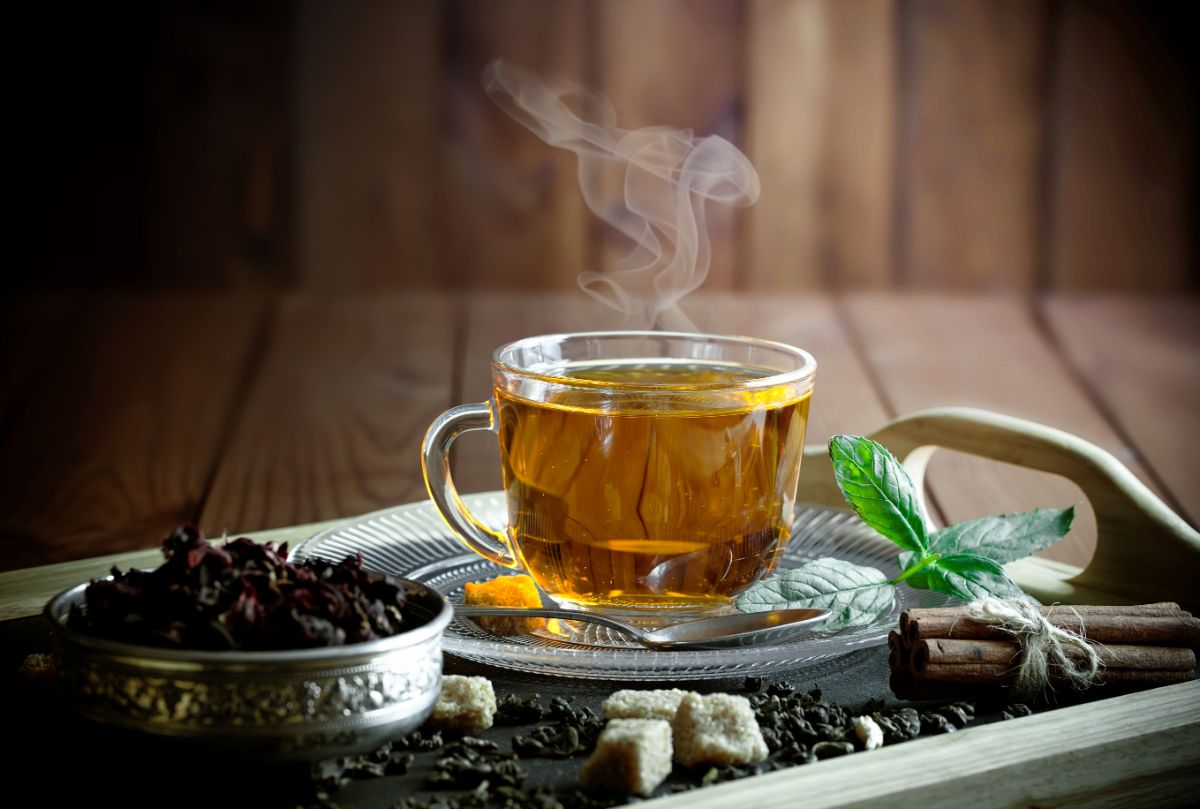 Cup of hot tea on a tray.