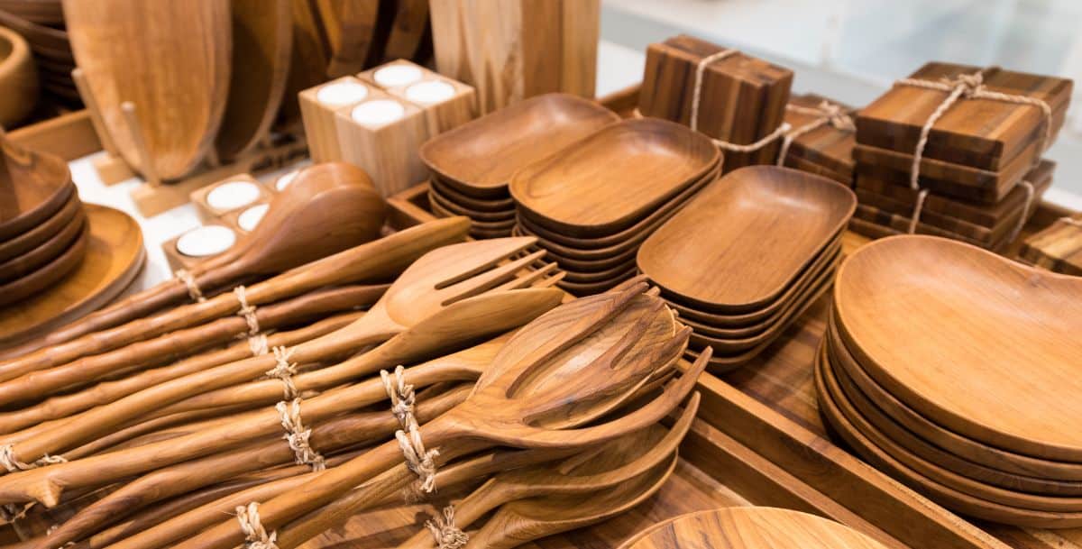 Different types of bamboo kitchenware on a table.