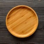Bamboo plate on a wooden table.
